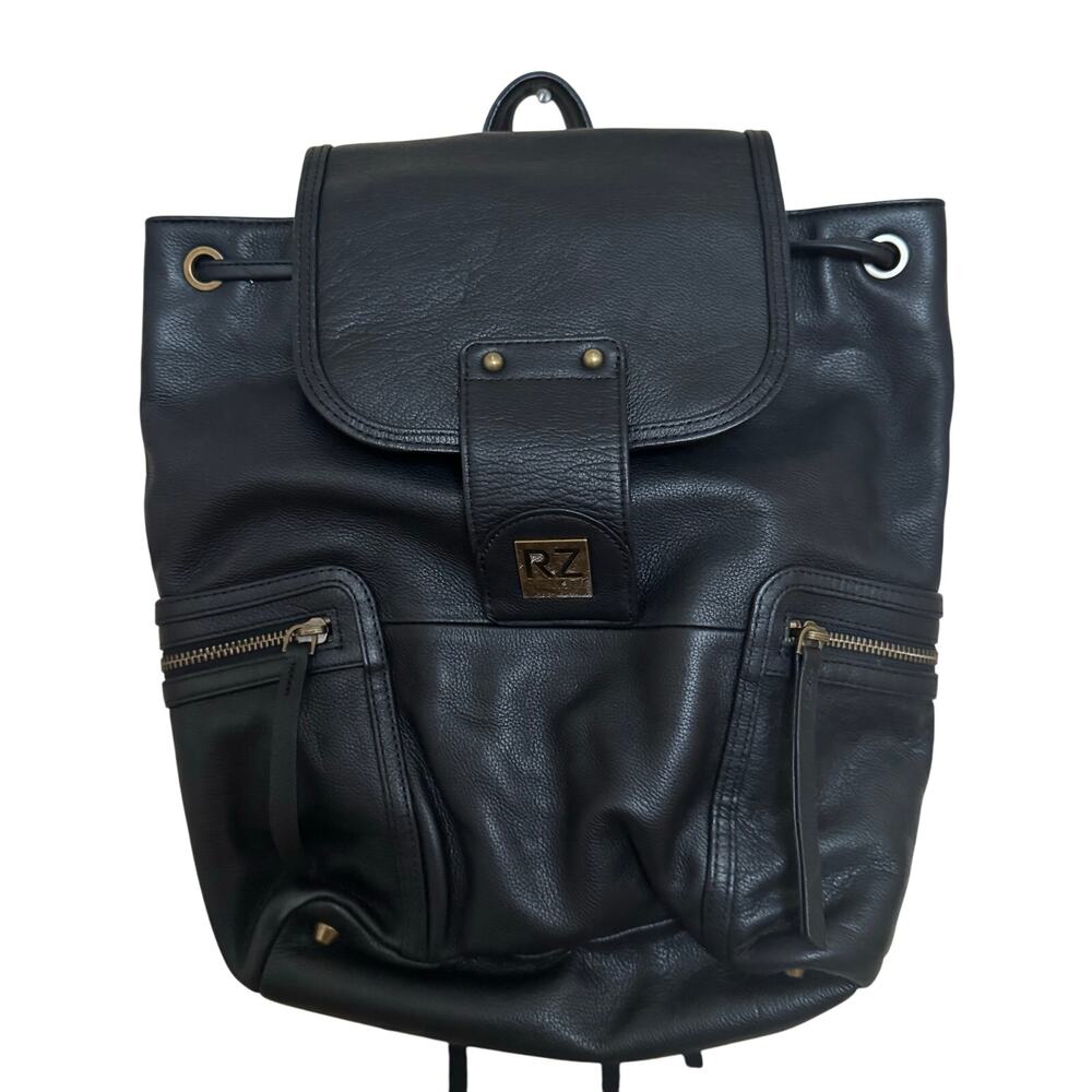 Rachel Zoe Black Leather Backpack Drawstring Zipper Pockets Strip Cloth Straps